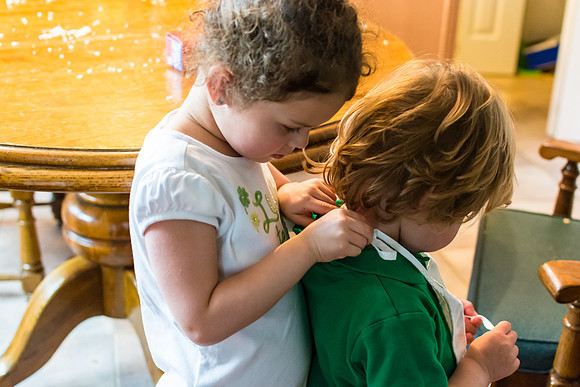Big Sister Helping Little Brother